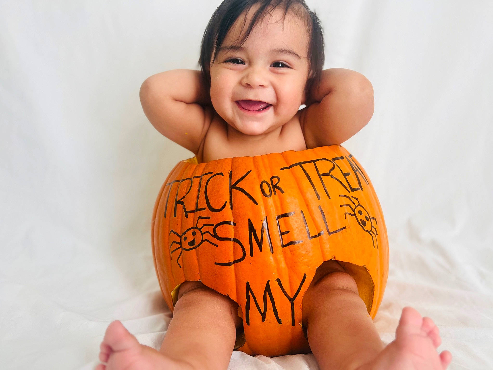 Sebastian is registered to the contest to win money with this photo: baby, baby_toddler_clothing, comfort, dress, eye, face, finger, flash_photography, gesture, hair, hand, happy, head, human_body, joy, neck, person, skin, sleeve, smile