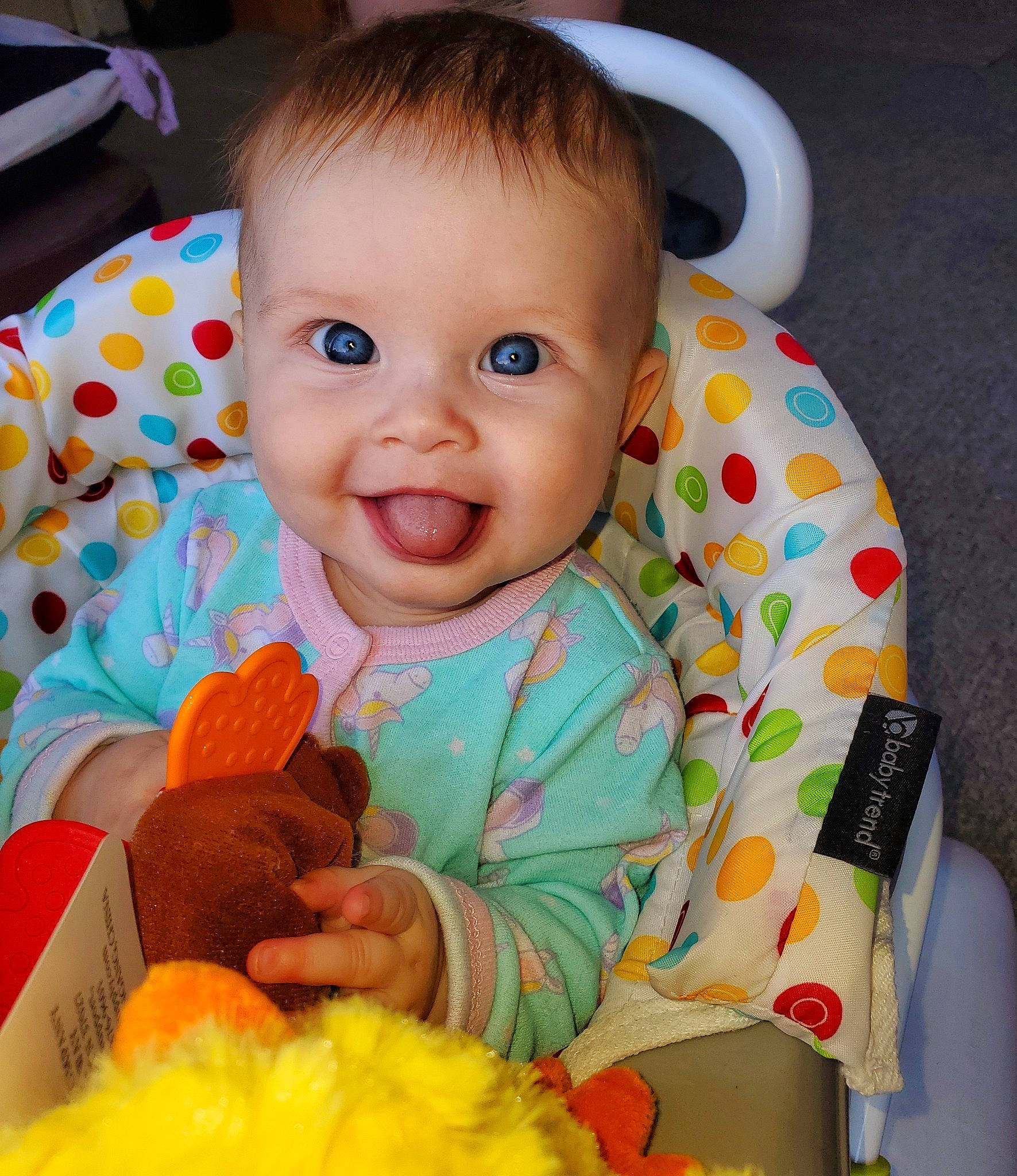 Hunter joined the competition — help win amazing prizes! baby, baby_playing_with_toys, baby_toddler_clothing, cheek, eye, face, finger, happy, head, iris, mouth, nose, orange, person, product, skin, sleeve, smile, textile, toddler