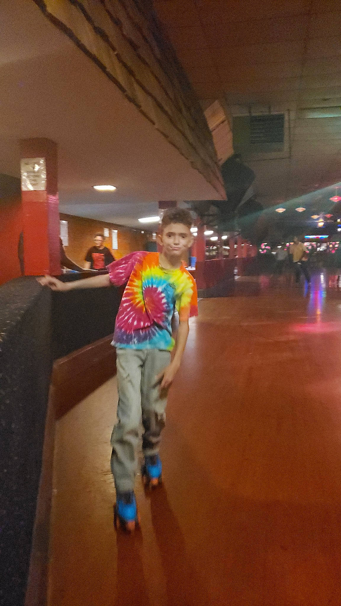 Darion is registered to the contest to win money with this photo: child, flooring, footwear, fun, person, standing