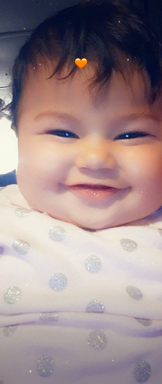 Janae is registered to the contest to win money with this photo: baby, beauty, cheek, child, chin, close_up, eye, eyebrow, eyelash, face, facial_expression, forehead, head, joy, lip, mouth, nose, person, skin, sky