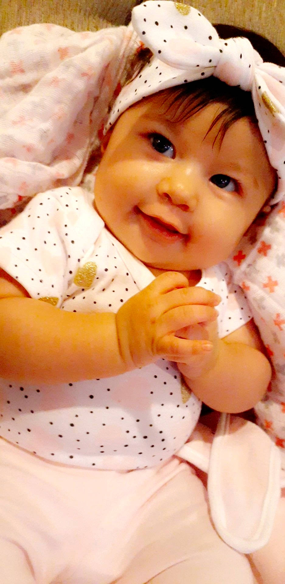 Janae is registered to the contest to win money with this photo: baby, cheek, child, happy, headwear, nose, pattern, person, pink, skin, smile, toddler