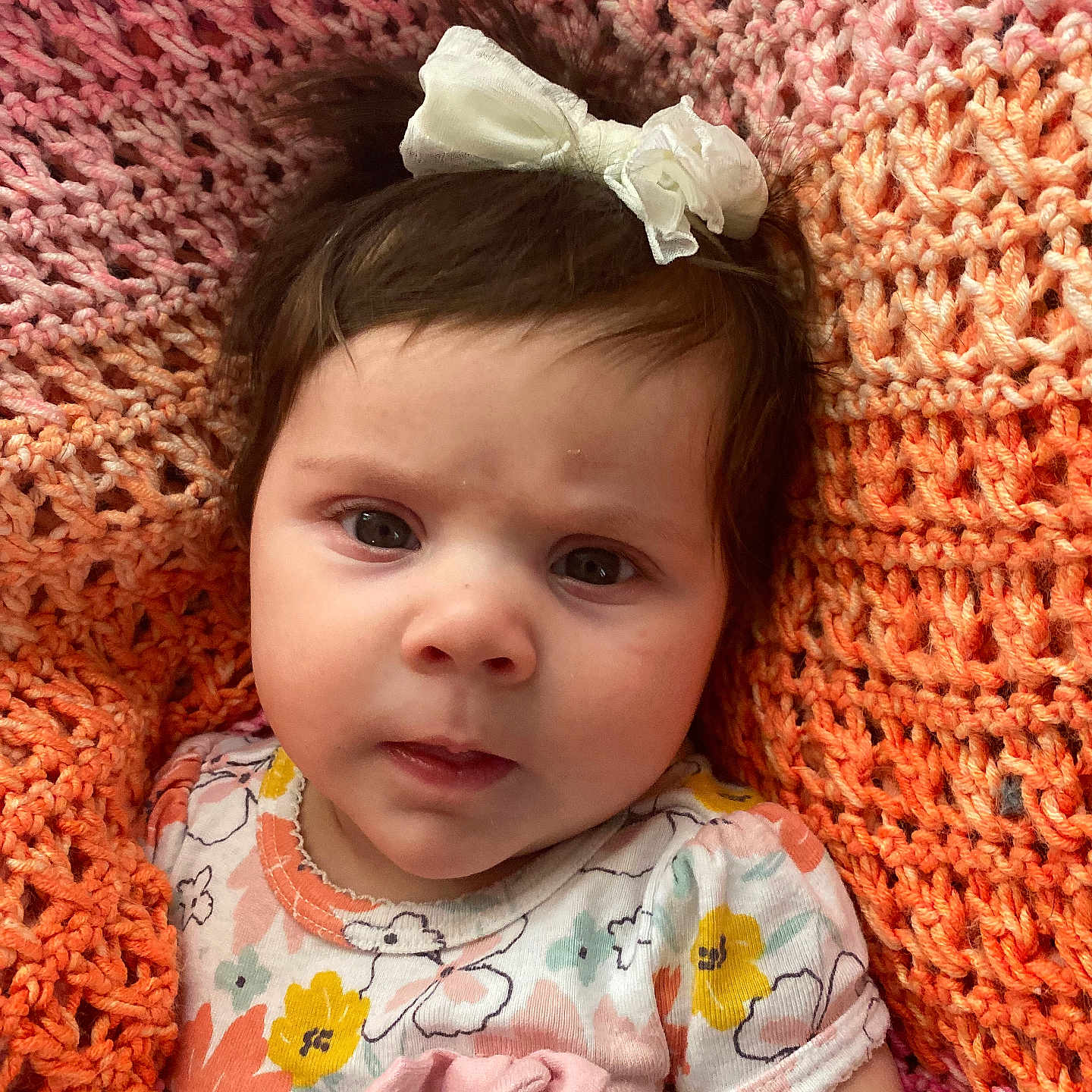 Jade is registered to the contest to win money with this photo: accessories, baby, bonnet, cap, clothing, couch, cushion, dress, earring, face, furniture, hat, head, homedecor, jewelry, newborn, person, photography, portrait, t_shirt