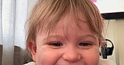 Tahlia is registered to the contest to win money with this photo: bangs, blue_jacket, child, close_up, cozy, curtain, cute, face, hair, happy, headset, hoodie, indoor, living_room, portrait, smile, toddler, tooth, tv_screen, zipper