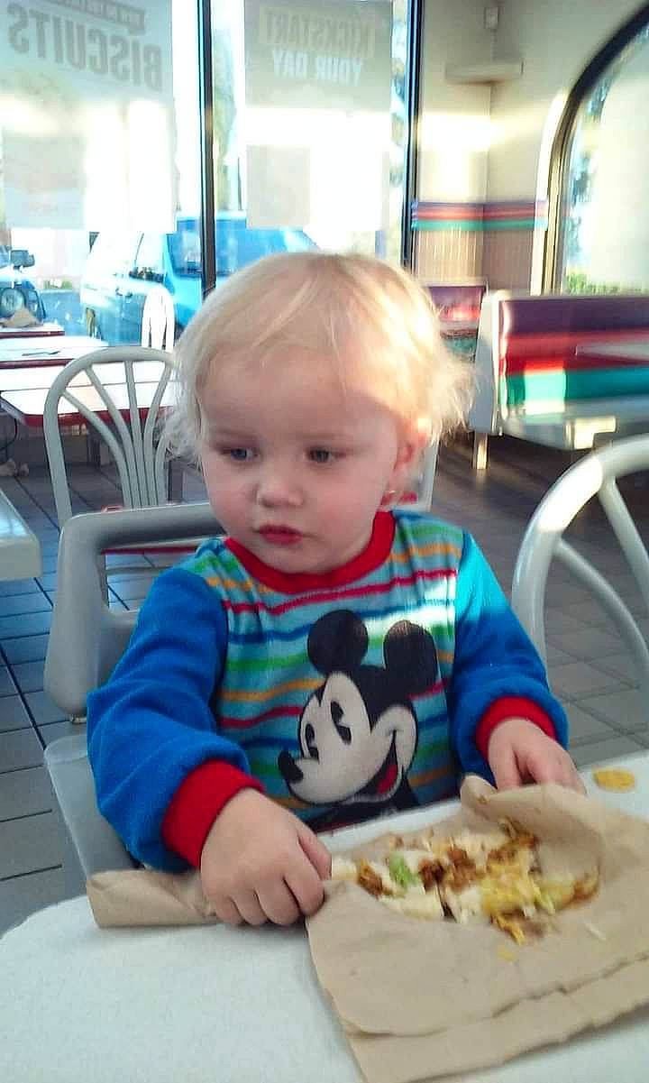 Emmanuelabraham is registered to the contest to win money with this photo: baby, chair, child, comfort_food, dish, finger_food, food, fun, junk_food, person, photograph, plate, recipe, room, sharing, sitting, snapshot, t_shirt, table, tableware