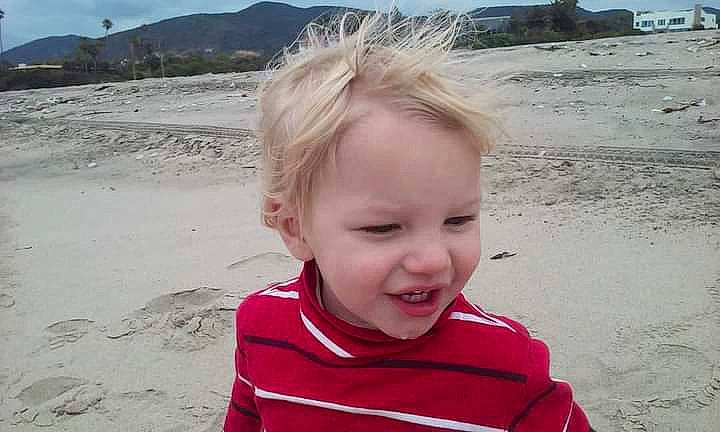 Emmanuelabraham joined the competition — help win amazing prizes! beach, child, coast, fun, happy, landscape, nose, ocean, person, portrait_photography, rock, sand, sky, sleeve, smile, surfer_hair, t_shirt, toddler, travel, vacation