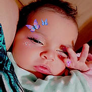 Izabella joined the competition — help win amazing prizes! baby, infant, child, portrait, sleepy, face, close_up, butterfly, face_stickers, sparkles, hand_gesture, peace_sign, blanket, polka_dots, clothing, indoors, soft_lighting, dark_hair, eyes_closed, cuddled