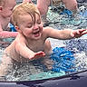 baby, child, infant, swimming, pool, water, splashing, happy, smiling, laughing, outdoor, summer, wet, bare_shoulders, blond_hair, face, portrait, family, recreation, playful