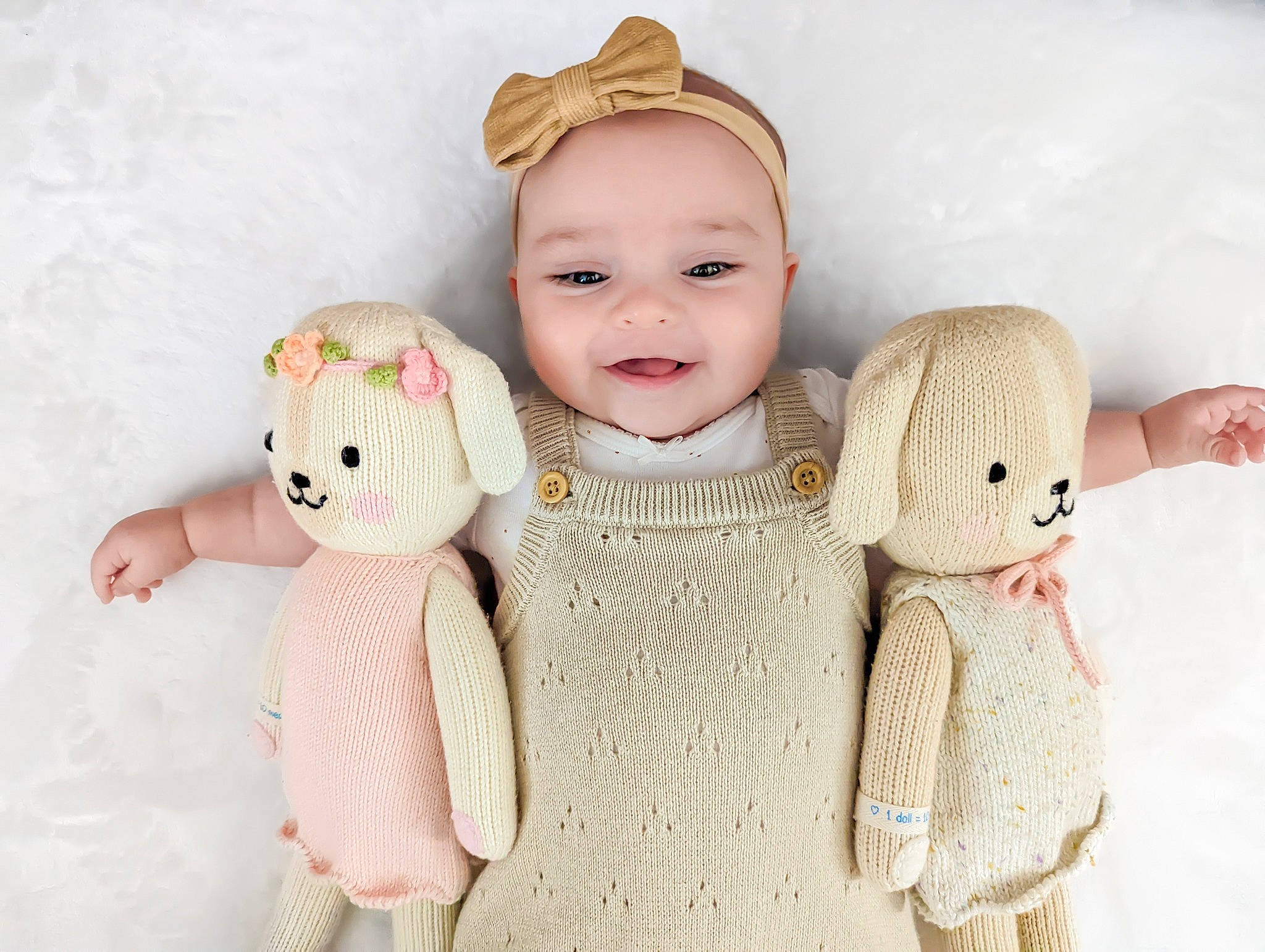 Camila joined the competition — help win amazing prizes! baby_toddler_clothing, child, doll, eyelash, fawn, finger, fur, gesture, hand, happy, head, joy, mammal, outerwear, person, pink, skin, sleeve, smile, textile