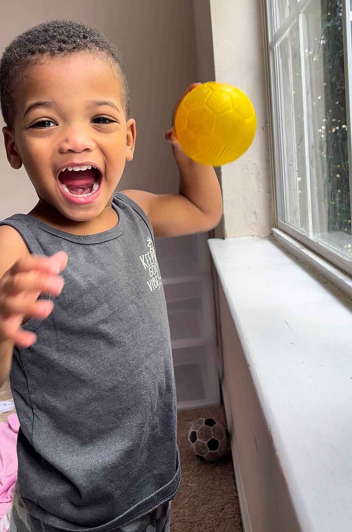 Ray Jr. joined the competition — help win amazing prizes! arm, baby, baby_toddler_clothing, child, finger, fun, gesture, happy, joint, leisure, party_supply, person, play, room, sleeve, smile, standing, t_shirt, thumb, toddler