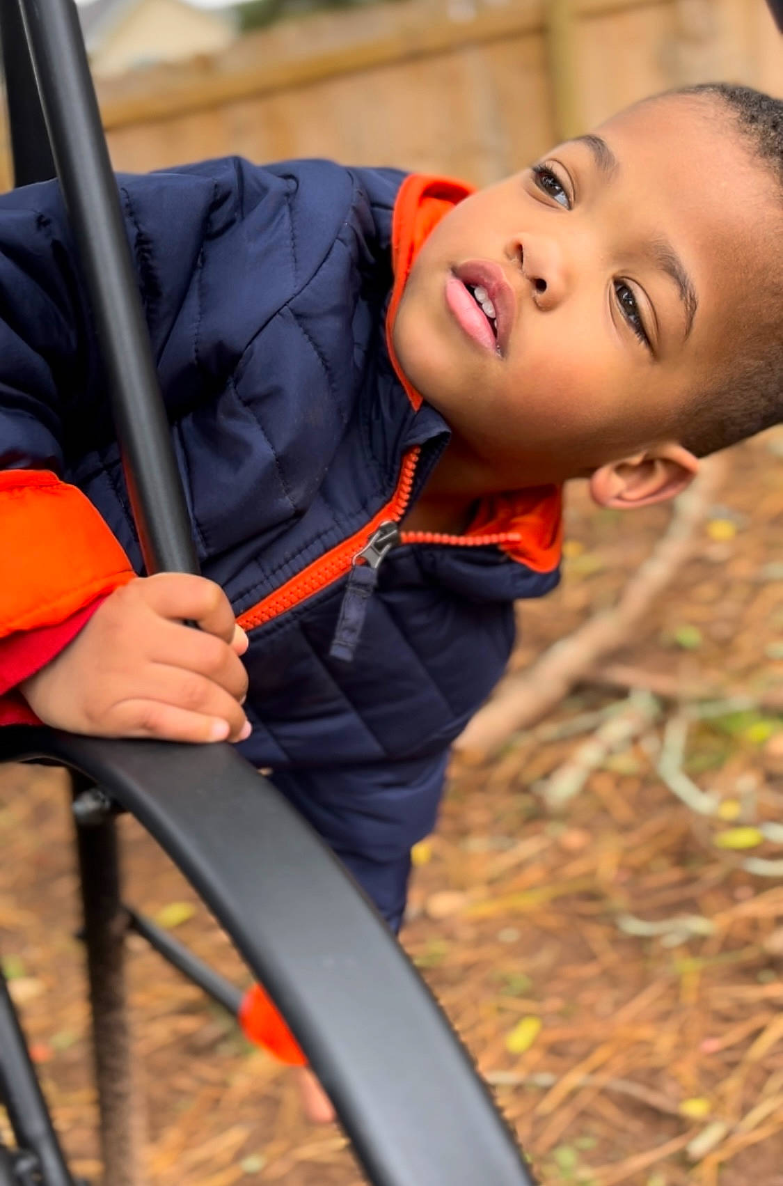Ray Jr. joined the competition — help win amazing prizes! automotive_tire, baby, bicycle_tire, child, electric_blue, fun, grass, happy, leisure, orange, outdoor_play_equipment, people_in_nature, person, recreation, rim, sitting, smile, soil, spoke, swing