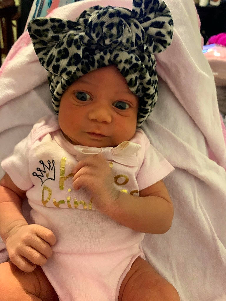Kehlani is registered to the contest to win money with this photo: baby, bonnet, child, headgear, headwear, person, toddler