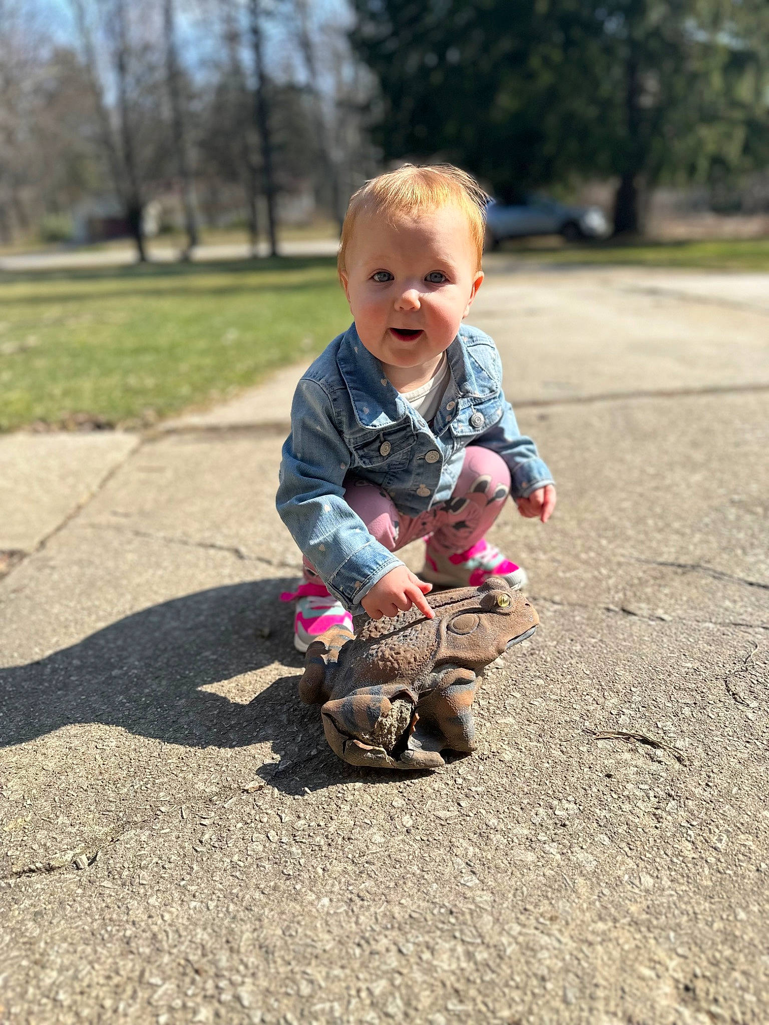Violet joined the competition — help win amazing prizes! asphalt, baby, baby_toddler_clothing, child, fun, grass, happy, human_body, human_leg, pattern, people_in_nature, person, plant, road_surface, sitting, sleeve, smile, soil, toddler, tree