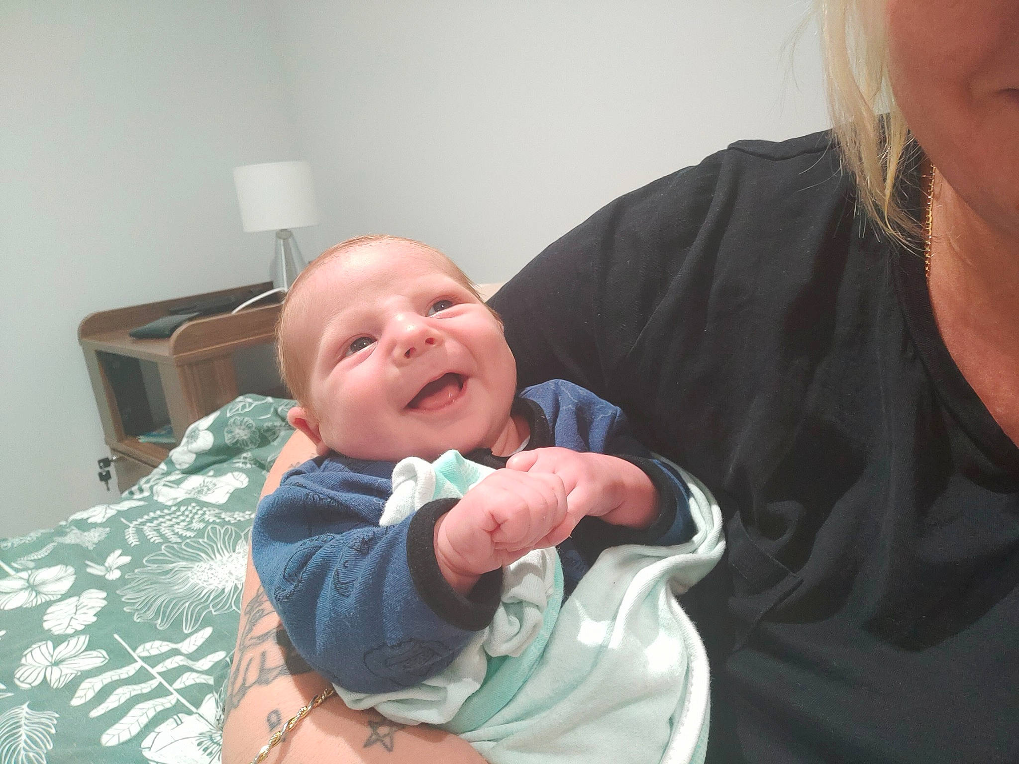 Kaiser joined the competition — help win amazing prizes! baby, baby_products, baby_toddler_clothing, bed, cheek, child, comfort, elbow, gesture, happy, jewellery, laugh, linens, mouth, person, sitting, sleeve, smile, t_shirt, thumb