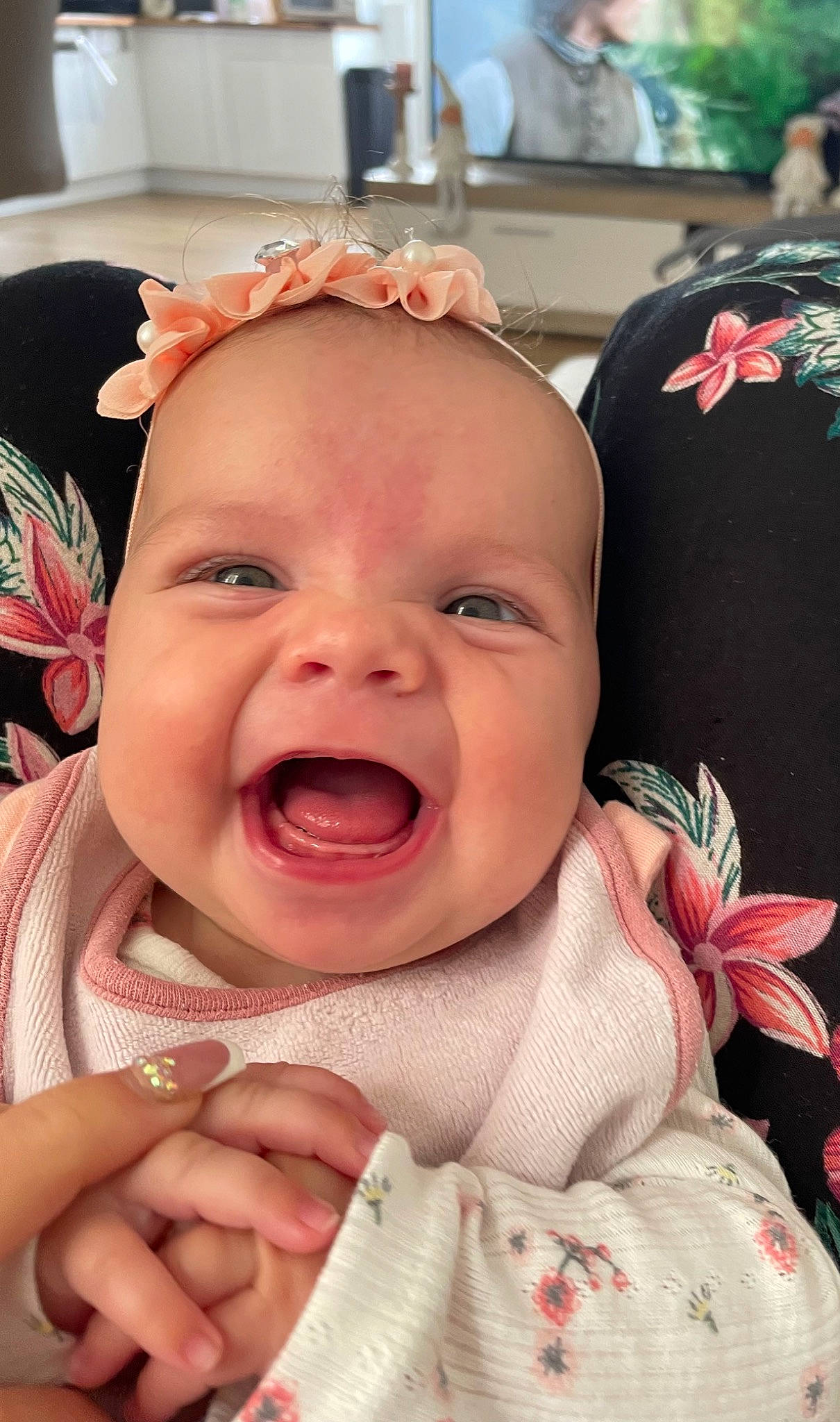 Nelya participe au concours pour gagner de l'argent avec cette photo : baby, baby_laughing, baby_toddler_clothing, cheek, child, chin, event, eyebrow, fun, gesture, happy, iris, lip, mouth, nose, person, pink, skin, smile, toddler