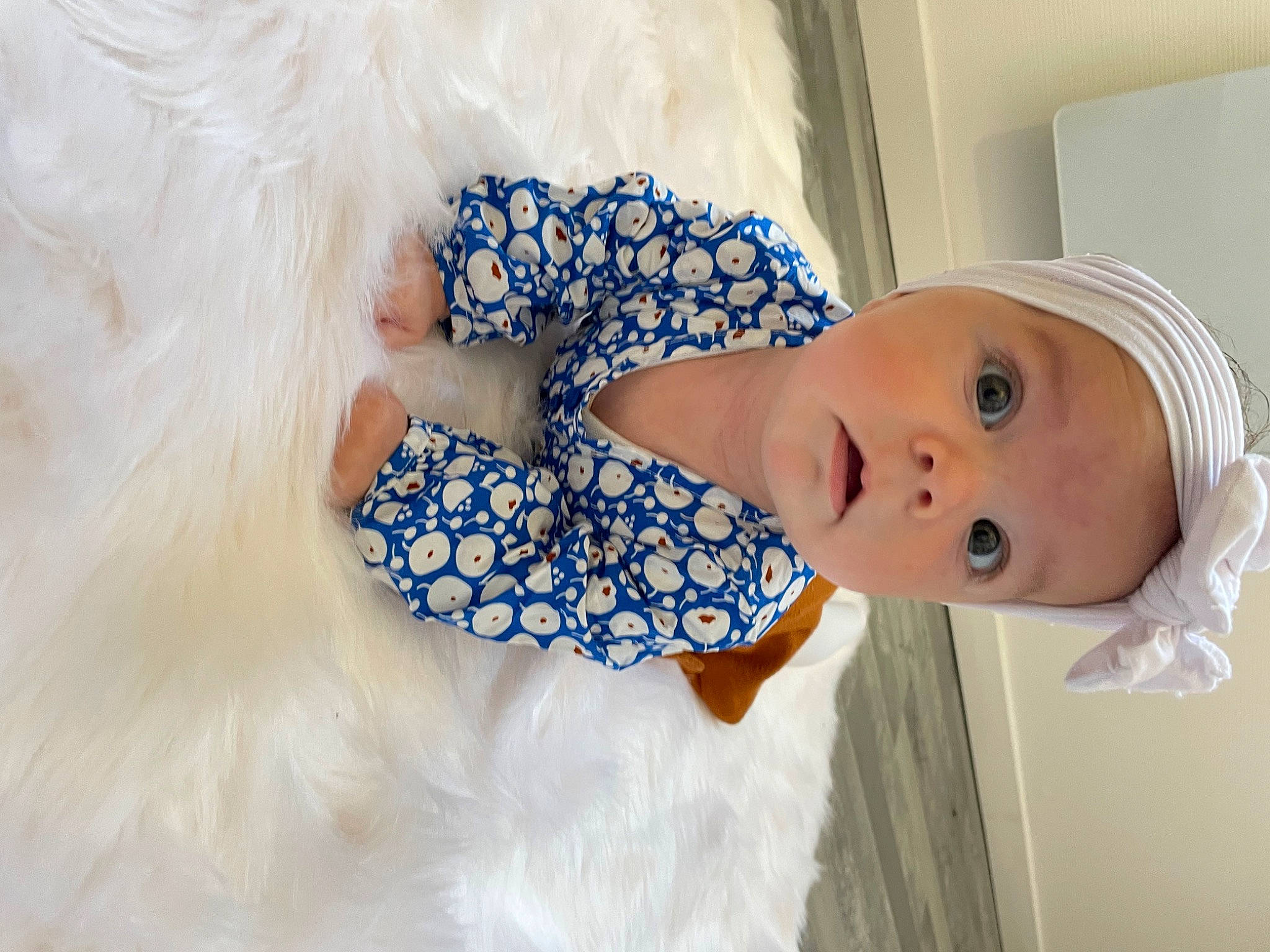 Nelya participe au concours pour gagner de l'argent avec cette photo : baby, baby_products, baby_toddler_clothing, cap, child, electric_blue, eyelash, fashion_accessory, fashion_design, fur, hair_accessory, happy, hat, linens, pattern, person, portrait_photography, skin, sun_hat, toddler