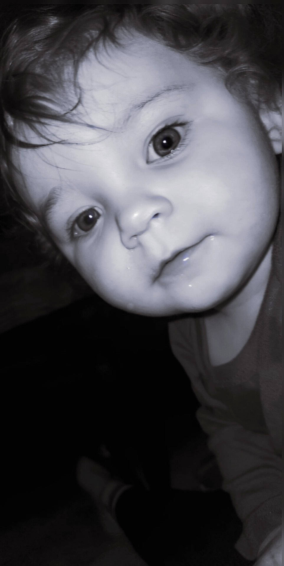 Liam Nicholas is registered to the contest to win money with this photo: baby, black_and_white, child, closeup, curly_hair, cute, expression, eyes, face, head_tilt, indoors, innocent, long_sleeve, monochrome, person, portrait, skin, soft_light, toddler, young