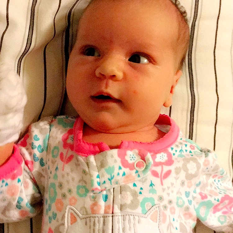 Addison joined the competition — help win amazing prizes! baby, baby_products, baby_toddler_clothing, cheek, child, face, head, lip, nose, outerwear, pattern, person, pink, skin, smile, textile, toddler