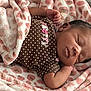 baby, bed, bedroom, blanket, bodypart, face, food, furniture, head, homedecor, indoors, meat, newborn, person, photography, pork, portrait, quilt, room, sleeping