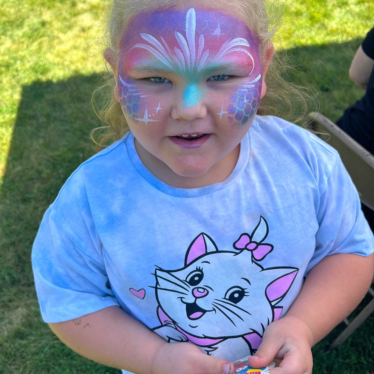 Journee is registered to the contest to win money with this photo: backyard, child, clothing, face, female, girl, grass, head, lawn, nature, outdoors, park, person, photography, plant, portrait, purple, summer, t_shirt, yard