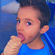 Shane joined the competition — help win amazing prizes! child, boy, ice_cream, soft_serve, outdoor, blue_sweater, spiderman, food, dessert, tongue, face, smudge, hand, table, tree, daylight, casual, cute, portrait, summer