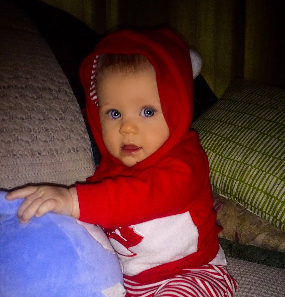 Addy joined the competition — help win amazing prizes! baby, baby_toddler_clothing, cheek, child, comfort, costume_hat, electric_blue, eye, fun, head, human_body, iris, lap, mouth, nose, person, sitting, skin, sleeve, smile