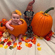 Valerie joined the competition — help win amazing prizes! baby, pumpkin, fall, autumn, leaves, orange, gourd, gourd_decoration, gnome, doll, smile, child, headband, blanket, holiday, cute, seasonal, festive, decoration, indoors