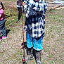Braidon is registered to the contest to win money with this photo: child, boy, fishing, fish, fishing_rod, outdoor, grass, boots, plaid_shirt, blue_shorts, catch, summer, nature, trees, child_playing, recreation, sunny_day, girl, curious_child, park