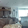 Ujoy participe au concours pour gagner de l'argent avec cette photo : dog, golden_retriever, sleeping, couch, pillow, blanket, indoor, living_room, window, chairs, table, daylight, relaxing, furniture, cozy, domestic, pet, resting, home, quiet