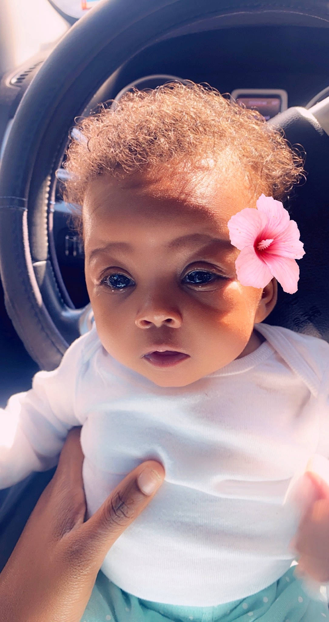 Spirit is registered to the contest to win money with this photo: baby_toddler_clothing, cheek, chin, dress, ear, eye, eyebrow, eyelash, flash_photography, flower, forehead, hairstyle, head, lip, mouth, neck, nose, organ, person, product