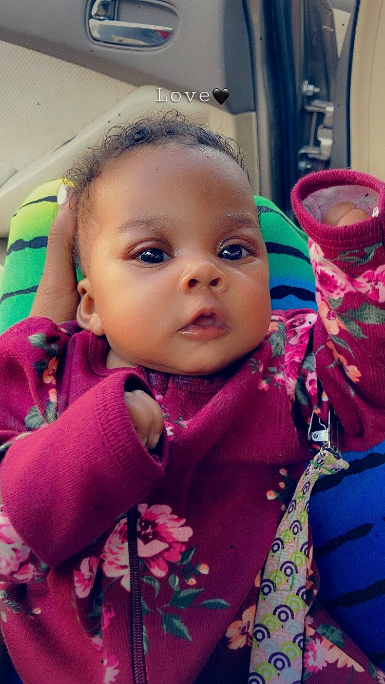 Spirit is registered to the contest to win money with this photo: baby, baby_toddler_clothing, cheek, child, cool, eyelash, face, facial_expression, fun, happy, iris, lip, mouth, nose, outerwear, person, pink, product, purple, skin