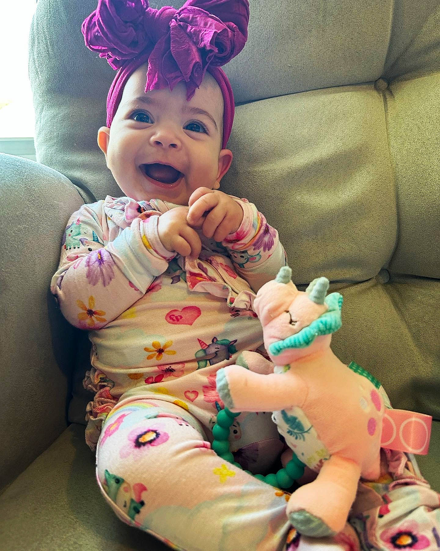 Juliette joined the competition — help win amazing prizes! arm, baby, baby_toddler_clothing, cap, comfort, eye, face, facial_expression, finger, hand, happy, head, human_body, mouth, person, pink, skin, sleeve, smile, textile