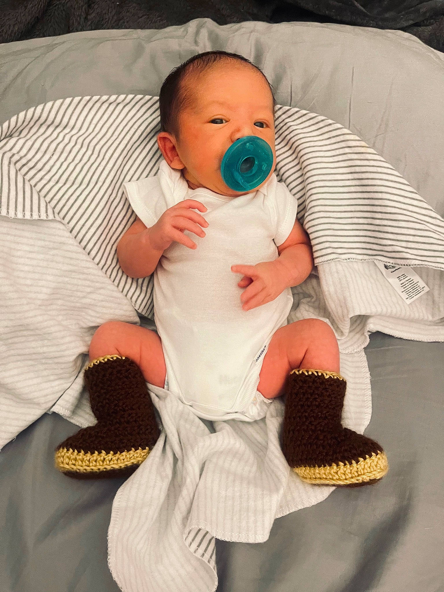 Lennon joined the competition — help win amazing prizes! abdomen, baby, baby_products, baby_sleeping, baby_toddler_clothing, cheek, child, comfort, human_leg, knee, lap, leg, nail, person, sitting, skin, sleeve, sock, thigh, toddler