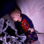 Malak is registered to the contest to win money with this photo: toddler, child, sleeping, pajamas, spiderman, blanket, couch, indoor, cozy, soft, comfort, nap, cute, baby, face, foot, hand, relaxation, peaceful, home