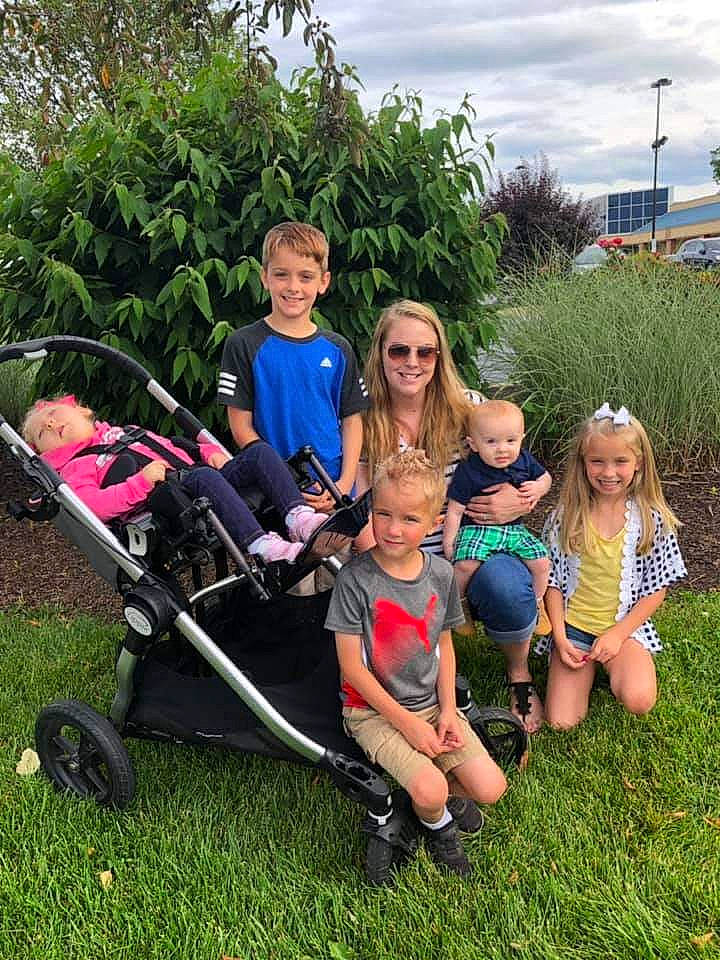 Breanna joined the competition — help win amazing prizes! baby_carriage, baby_products, fun, grass, joy, lawn, leisure, person, plant, product, tree, vehicle