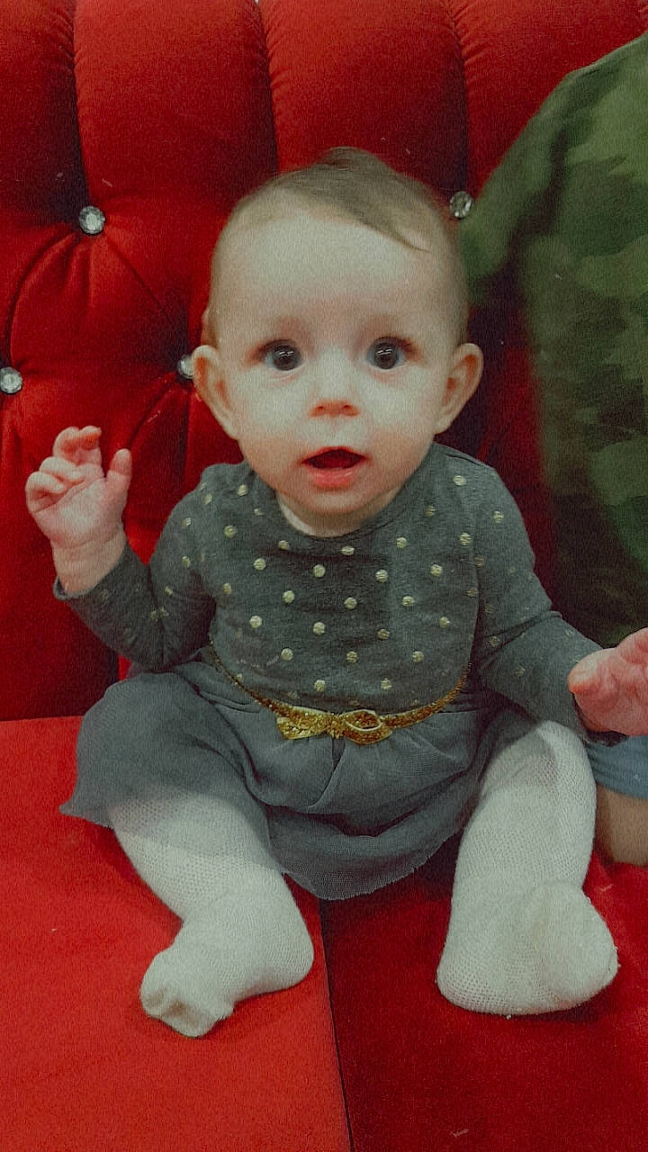 Arianna joined the competition — help win amazing prizes! arm, baby_toddler_clothing, cheek, chin, eye, face, facial_expression, hair, hairstyle, hand, human_body, lip, mouth, nose, organ, person, pink, product, skin, sleeve