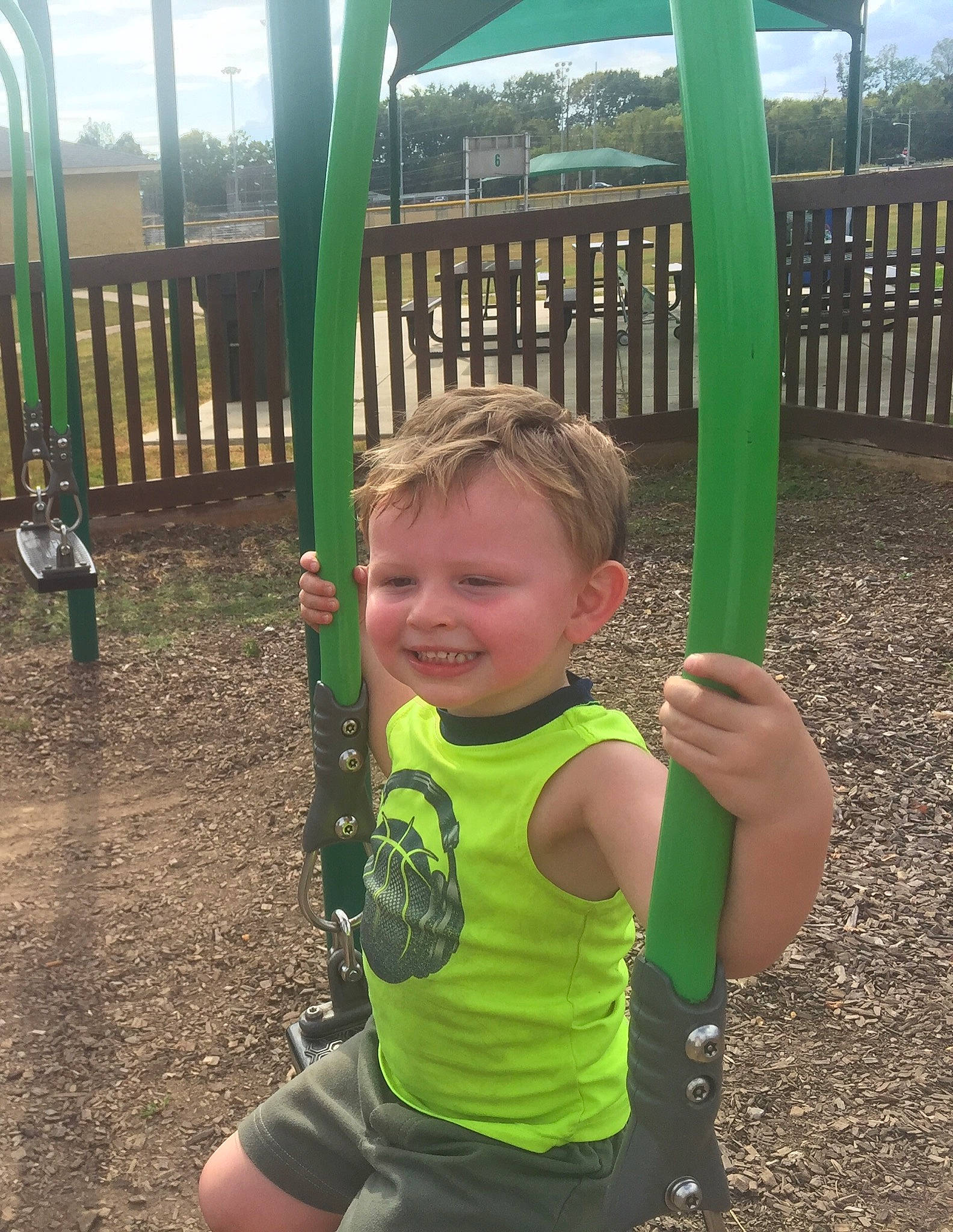 Jaxxon is registered to the contest to win money with this photo: child, city, fun, green, human_settlement, joy, leisure, outdoor_play_equipment, park, person, plant, play, playground, public_space, recreation, smile, toddler, vacation