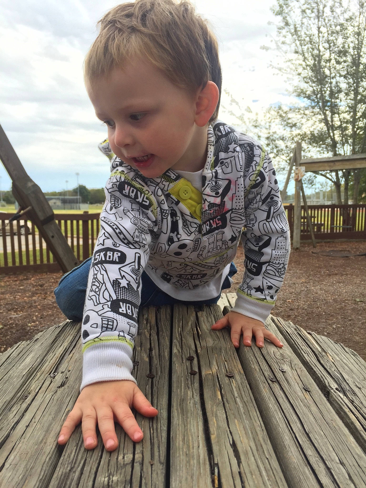 Jaxxon joined the competition — help win amazing prizes! child, deck, grass, hand, pattern, person, plant, play, sitting, toddler, tree, vacation, wood