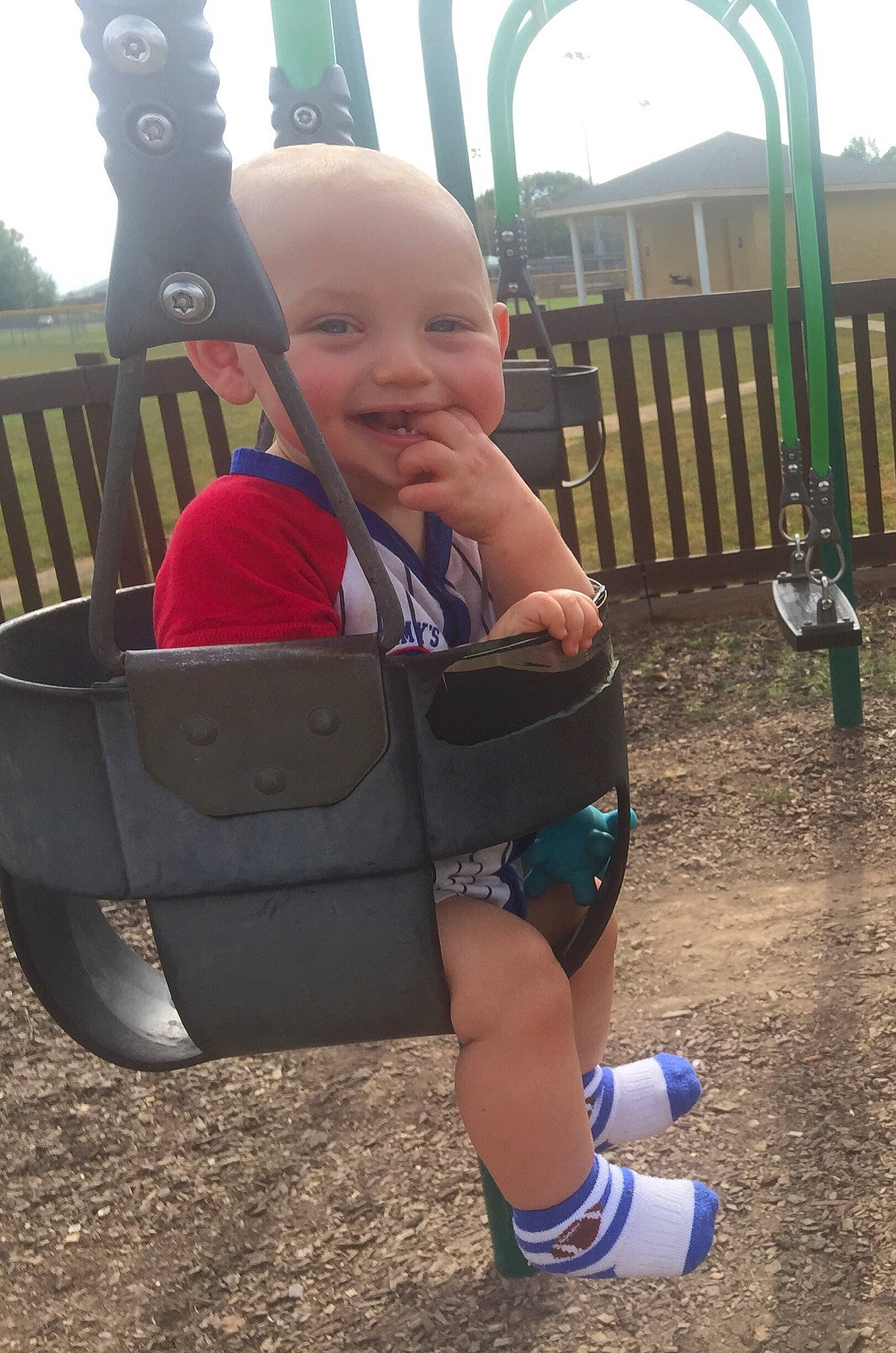 Crimson is registered to the contest to win money with this photo: baby, baby_products, child, fun, joy, leg, leisure, person, play, playground, product, smile, swing, toddler, tree, vacation