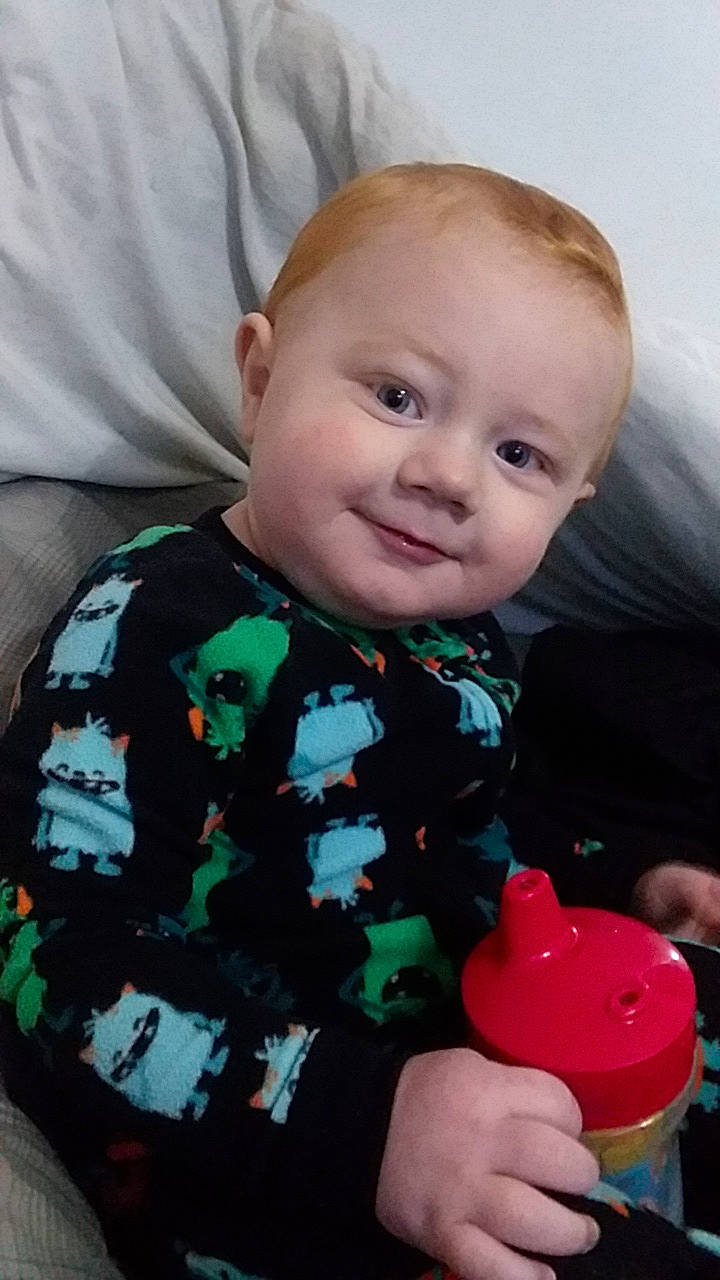 Alistair is registered to the contest to win money with this photo: baby, baby_products, cheek, child, face, head, person, play, product, sitting, skin, smile, toddler