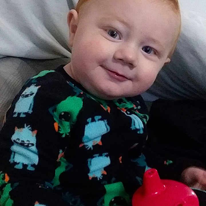 Alistair is registered to the contest to win money with this photo: baby, baby_products, cheek, child, face, head, person, play, product, sitting, skin, smile, toddler