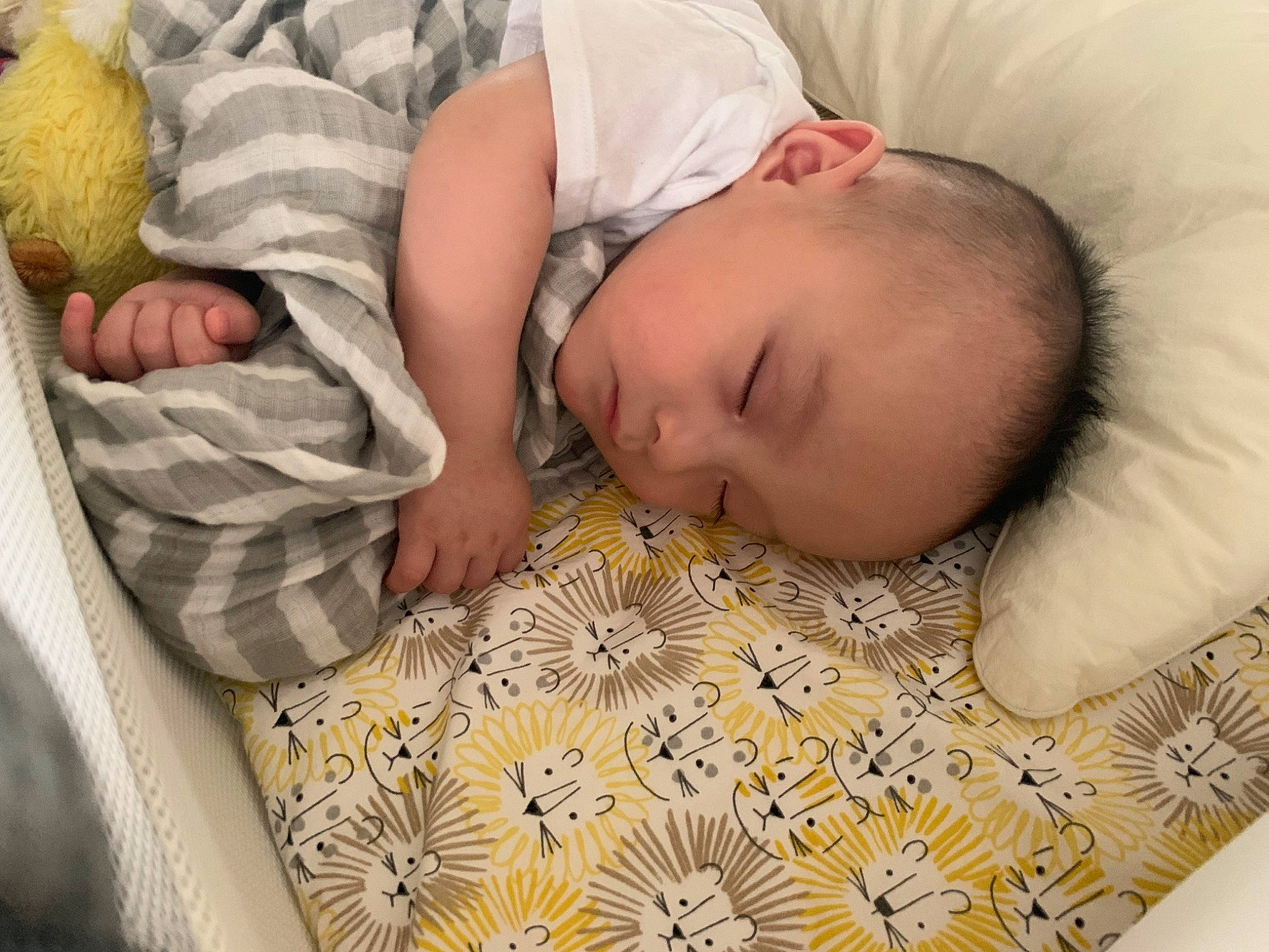 Leon is registered to the contest to win money with this photo: baby, baby_products, baby_safety, baby_sleeping, baby_toddler_clothing, bed, bed_sheet, bedding, bedtime, blanket, child, comfort, linens, nap, pattern, person, room, skin, sleep, textile