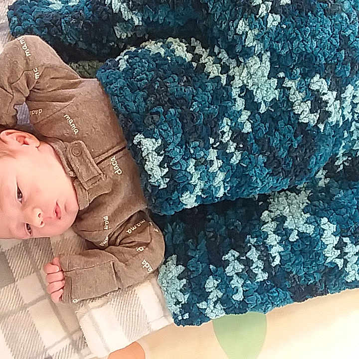 Camden is registered to the contest to win money with this photo: baby, child, leg, outerwear, pattern, sleep, textile, toddler