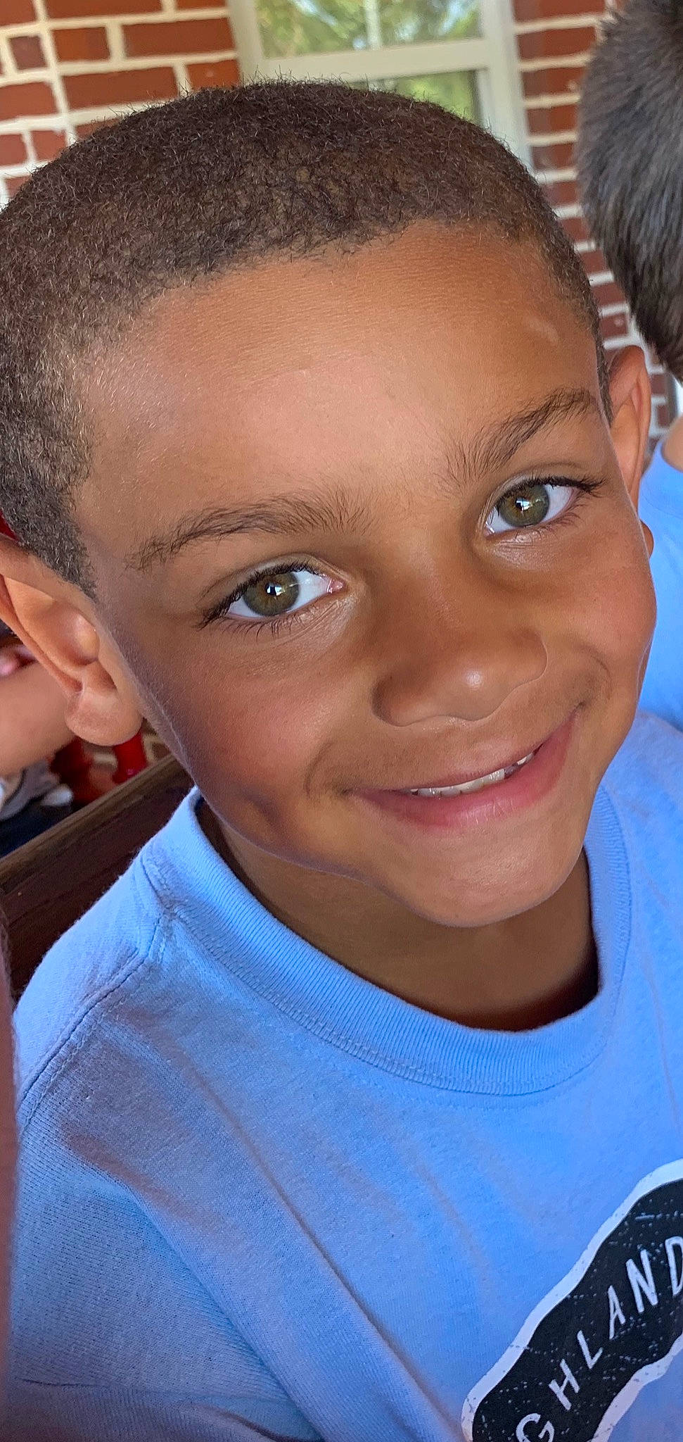 Jorden is registered to the contest to win money with this photo: black_hair, caesar_cut, cheek, child, chin, ear, eye, eyebrow, face, facial_expression, forehead, hair, hairstyle, head, jaw, joy, lip, nose, person, skin