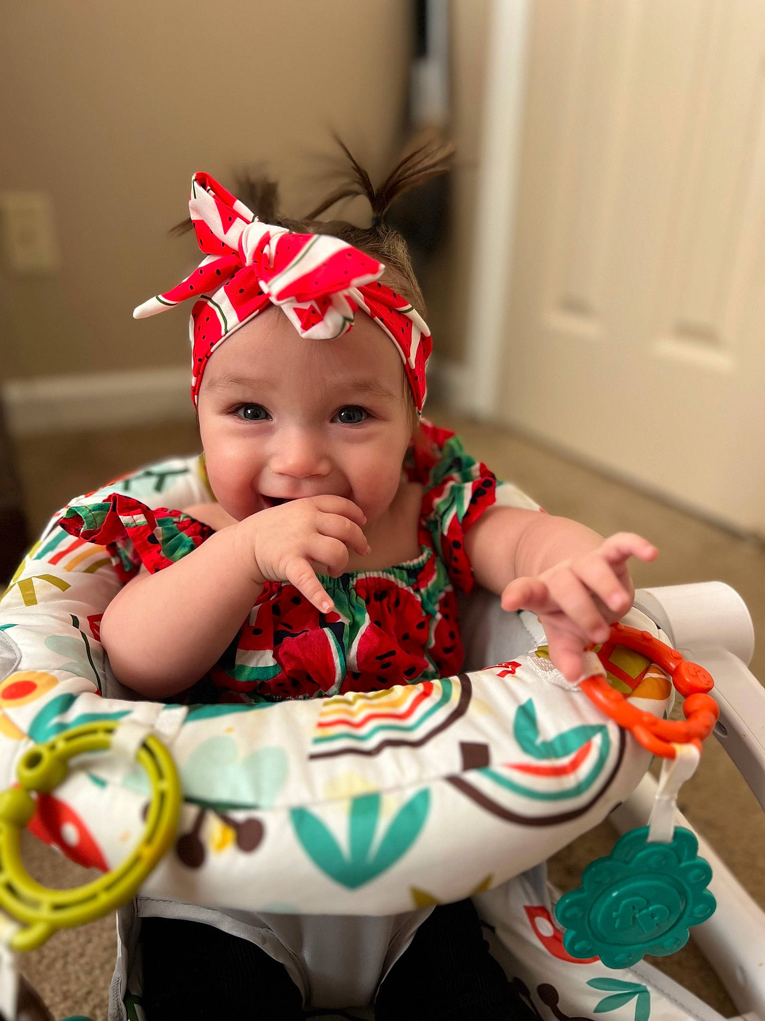 Katalina is registered to the contest to win money with this photo: baby, baby_products, baby_toddler_clothing, carmine, child, christmas, door, event, fun, happy, head, headgear, headwear, holiday, person, personal_protective_equipment, room, sitting, sleeve, smile
