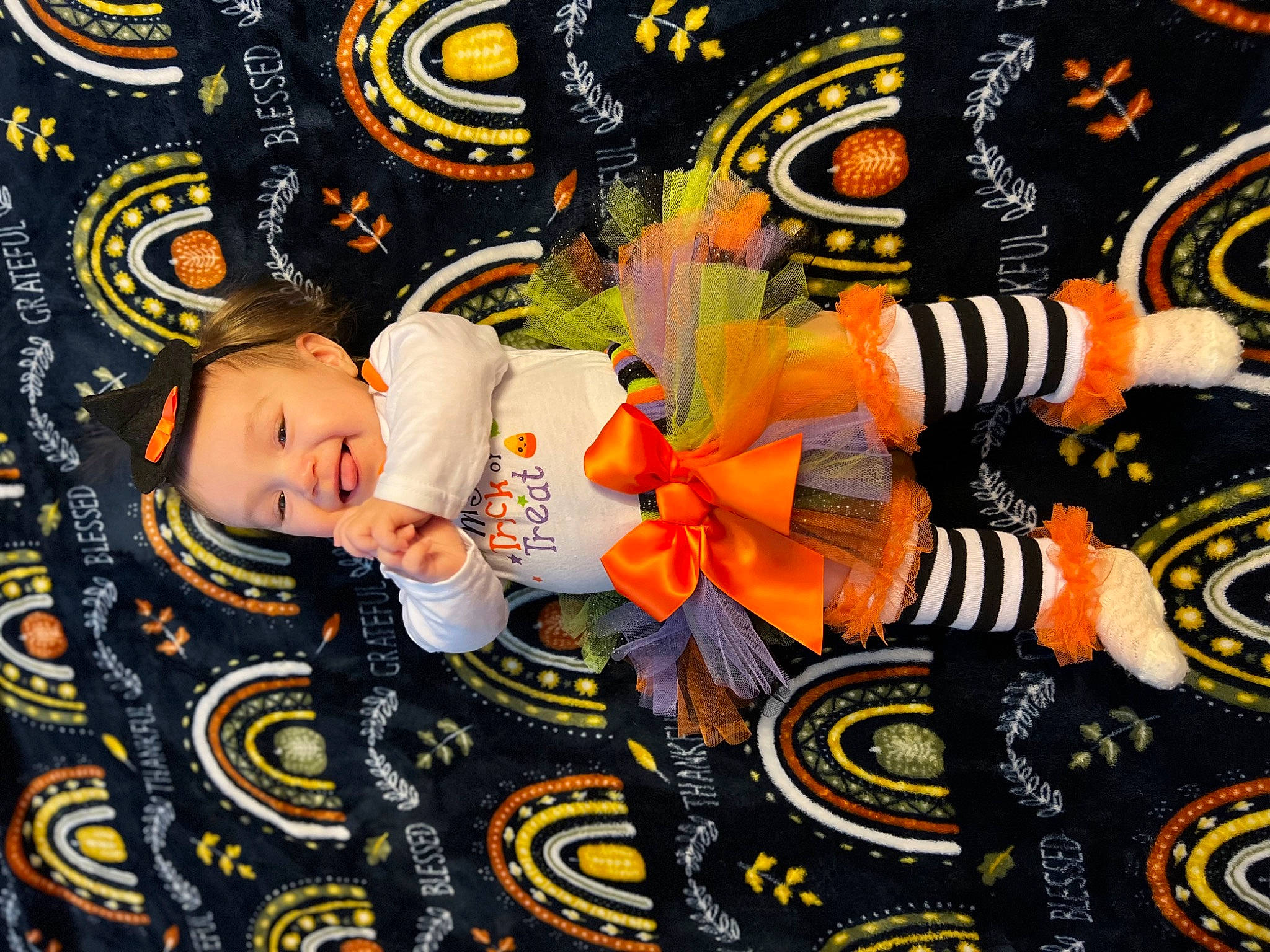 Katalina is registered to the contest to win money with this photo: art, baby, baby_toddler_clothing, child, fashion_accessory, font, happy, hat, headgear, orange, pattern, person, photomontage, plant, room, textile, toddler, tree, visual_arts