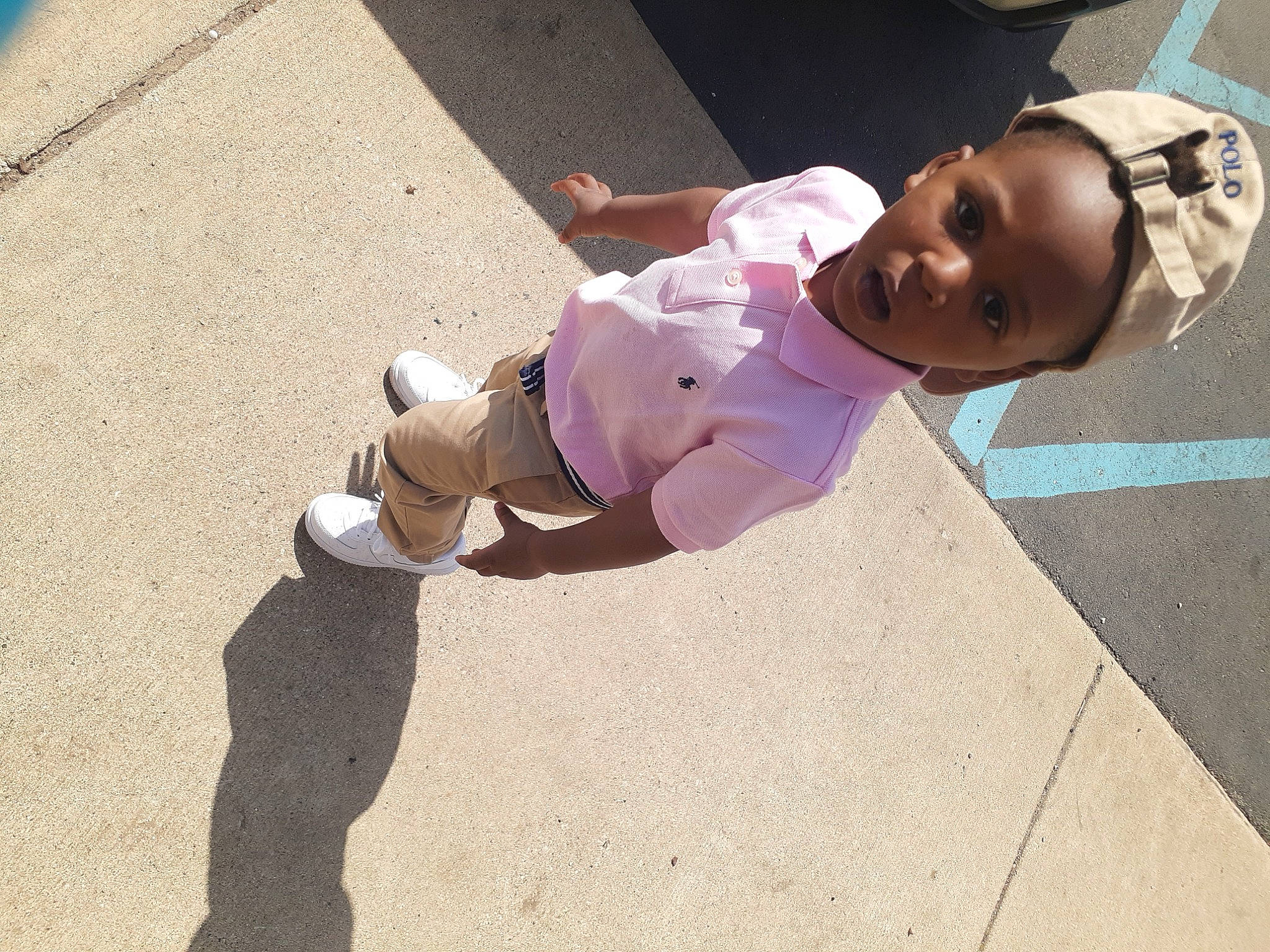 Za'Mir joined the competition — help win amazing prizes! asphalt, child, concrete, eyewear, floor, flooring, foot, fun, hat, human_leg, knee, pedestrian, person, recreation, road_surface, shadow, sidewalk, smile, sock, thigh