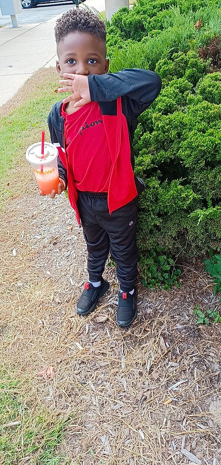 Za'Mir joined the competition — help win amazing prizes! boot, bucket, drink, drinking, fun, grass, hat, people_in_nature, person, personal_protective_equipment, plant, rain_boot, raincoat, recreation, sleeve, soil, sweatpant, tableware, windbreaker