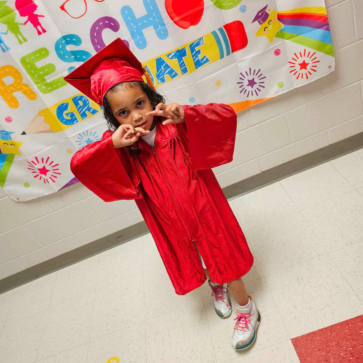 Kaydence joined the competition — help win amazing prizes! bodypart, child, clothing, coat, face, female, finger, footwear, girl, graduation, hand, hat, head, people, person, photography, portrait, shoe, student, text