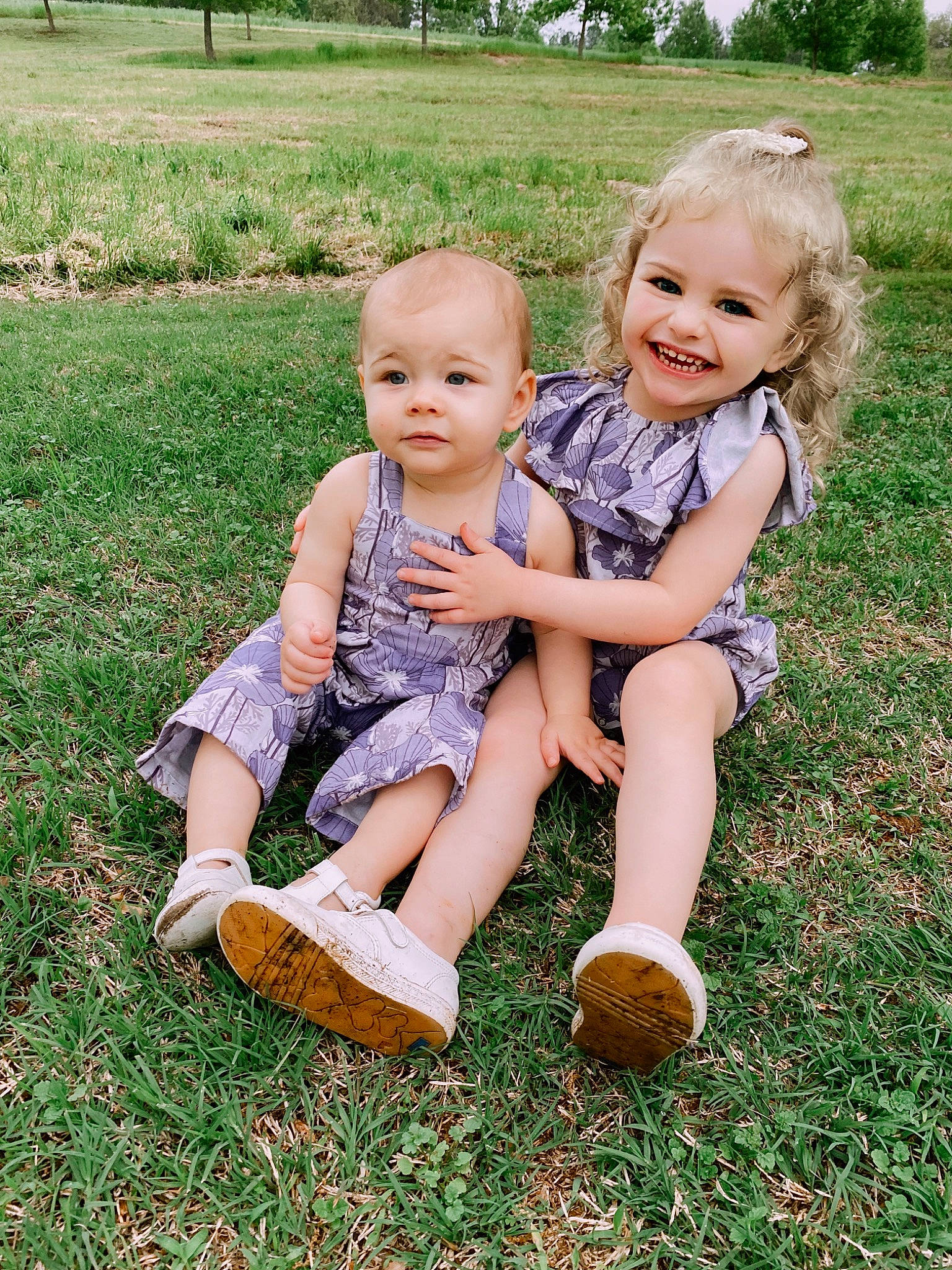 Ellie joined the competition — help win amazing prizes! baby_toddler_clothing, botany, child, dress, eye, face, grass, grass_family, happy, head, joy, leaf, nature, people_in_nature, person, plant, playing_with_kids, shoe, smile, summer