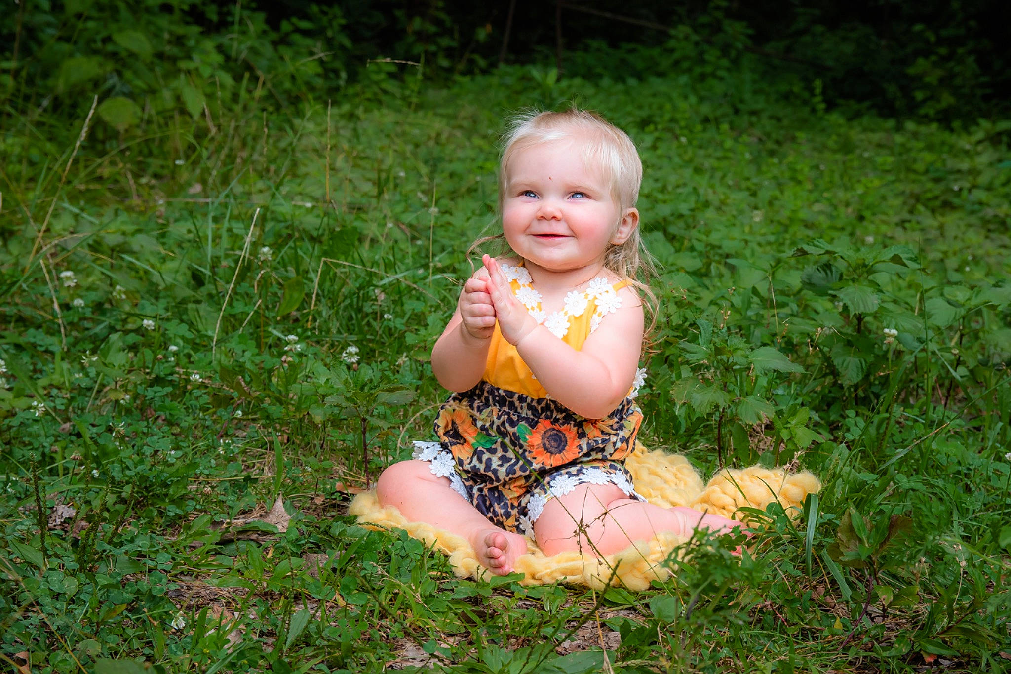 Lena joined the competition — help win amazing prizes! baby, baby_toddler_clothing, child, dress, fun, grass, grass_family, grassland, groundcover, happy, joy, lawn, meadow, natural_environment, people_in_nature, person, plant, sitting, smile, terrestrial_plant